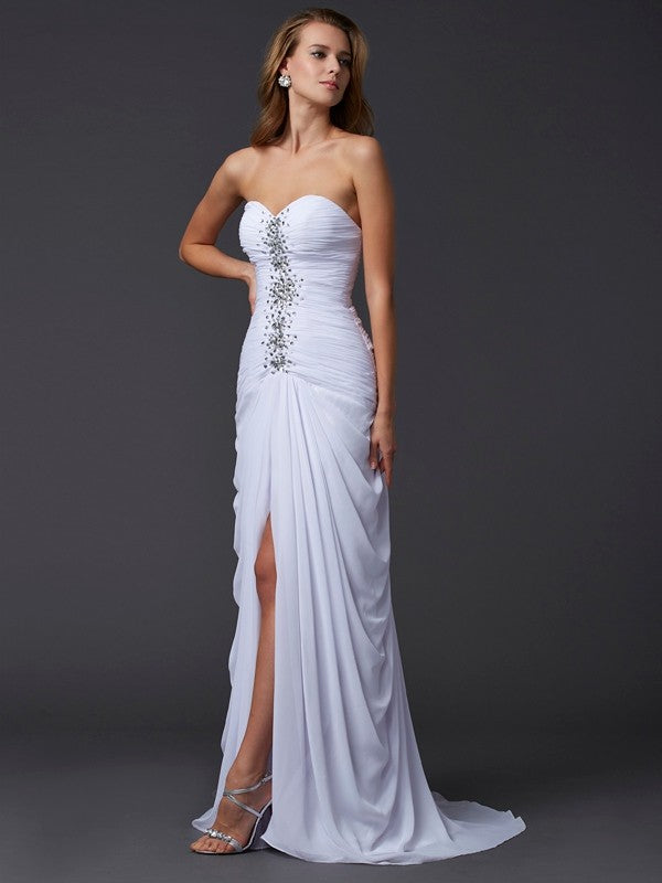 Robe longue en mousseline de soie à perles et manches courtes